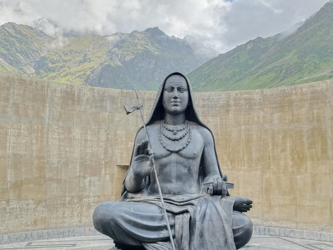 The statue of Śaṅkara behind the Kedārnāth temple